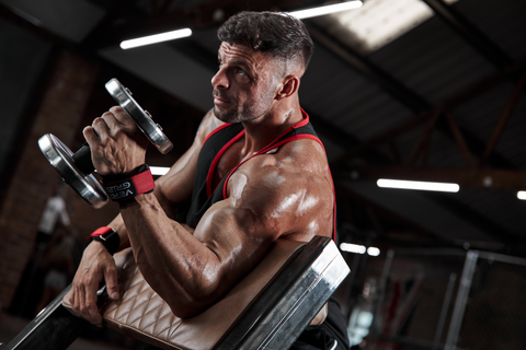 Professional weightlifter training safely in the gym using Versa Gripps